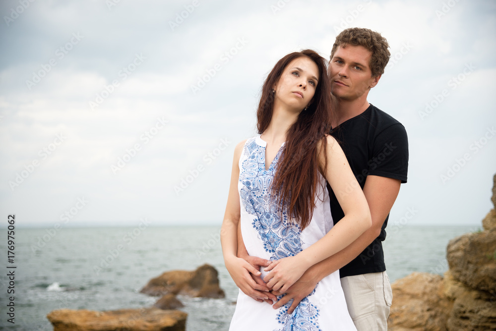 Fototapeta premium Young couple on the beach