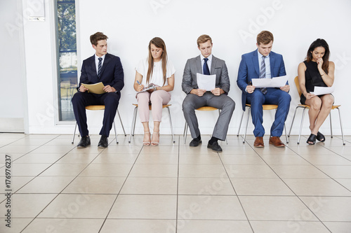 Candidates wait for job interviews, full length, copy space