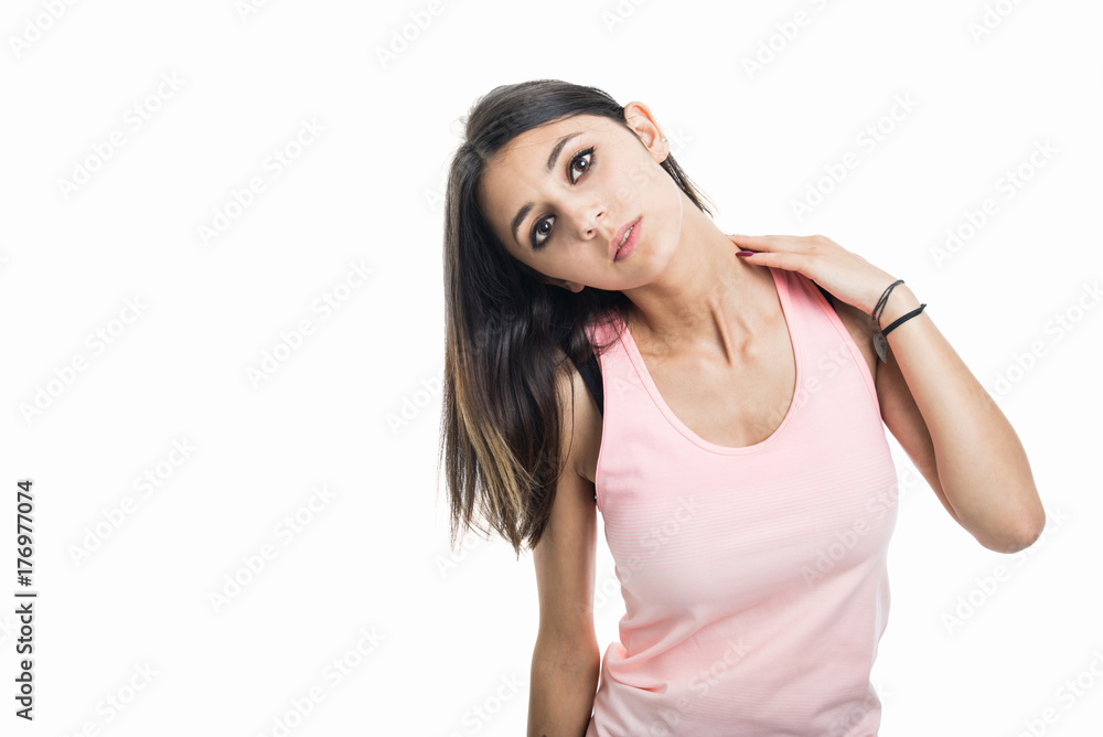 Portrait of fit girl wearing sportswear stretching neck Portrait of fit girl wearing sportswear stretching neck
