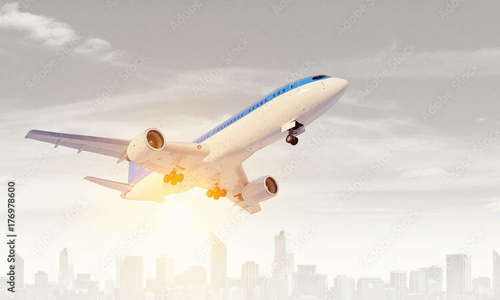 Naklejka premium Airliner in sky. Mixed media