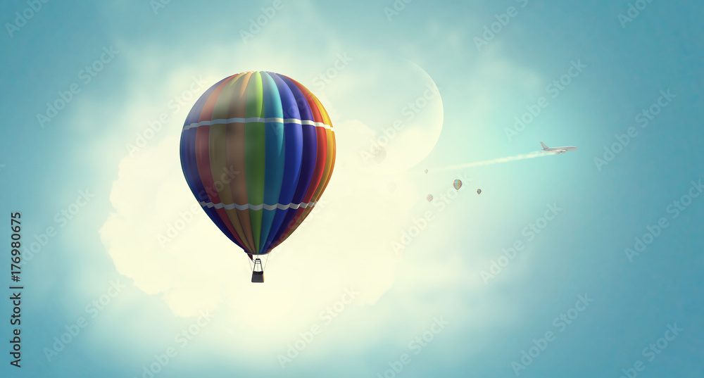 Fototapeta premium Aerostat floating in day sky. Mixed media