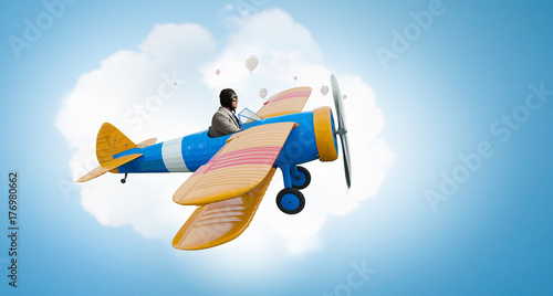 man flying in retro plane. Mixed media