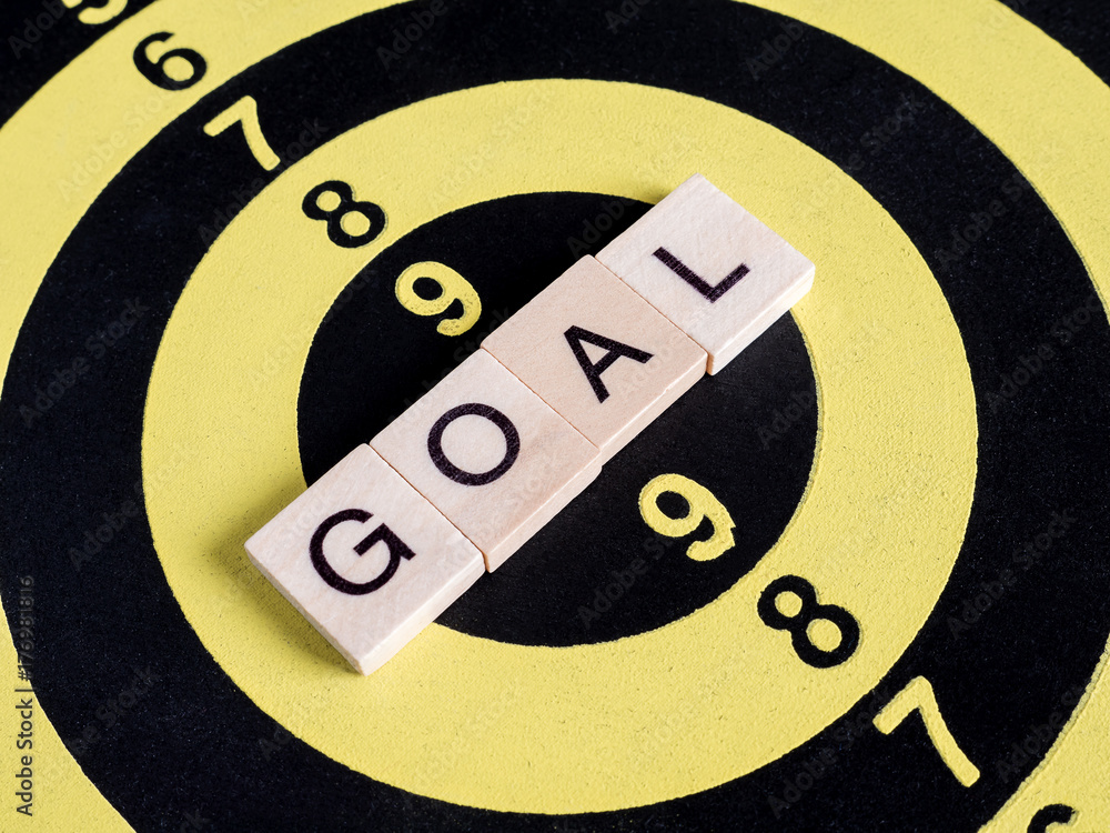 Obraz premium Word spell Goal on dart board 1