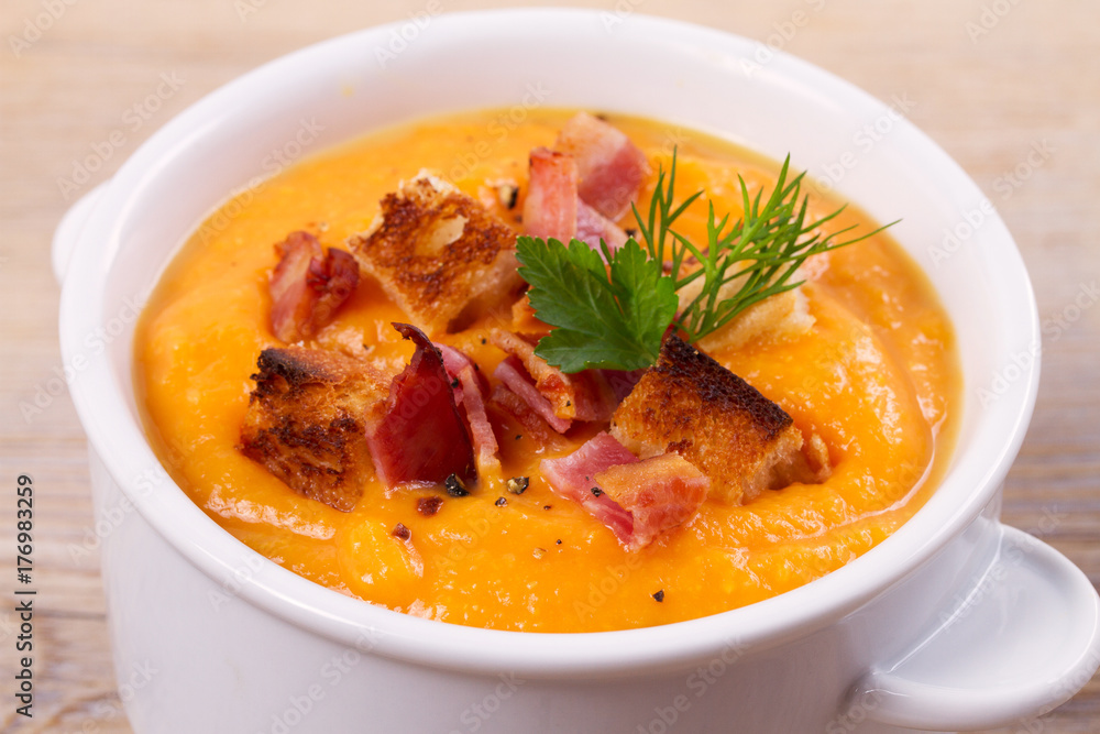 Butternut Squash and Bacon Soup in White Bowl, horizontal Butternut Squash and Bacon Soup in White Bowl, horizontal