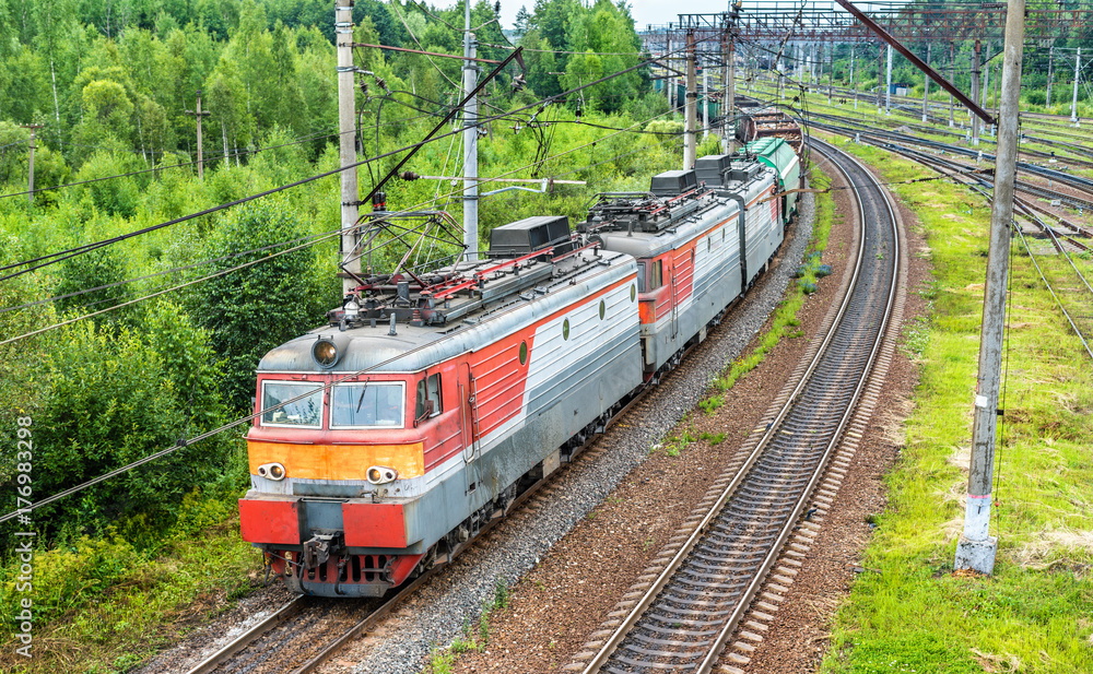 Naklejka premium Freight train at Bekasovo-Sortirovochnoye station, the largest in Europe railway station. Moscow, Russia