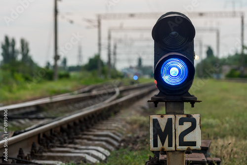 blue light on the railway semaphore photo