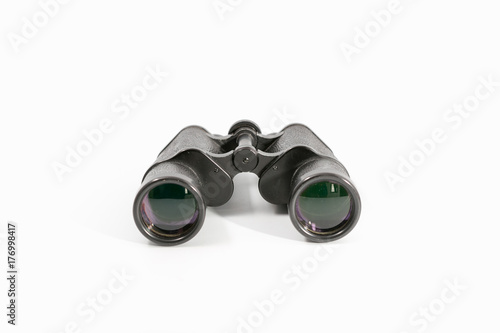 binoculars with large magnification on a monophonic background.