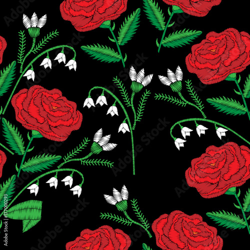 Seamless pattern with red rose and lily of the valley embroidery stitches imitation