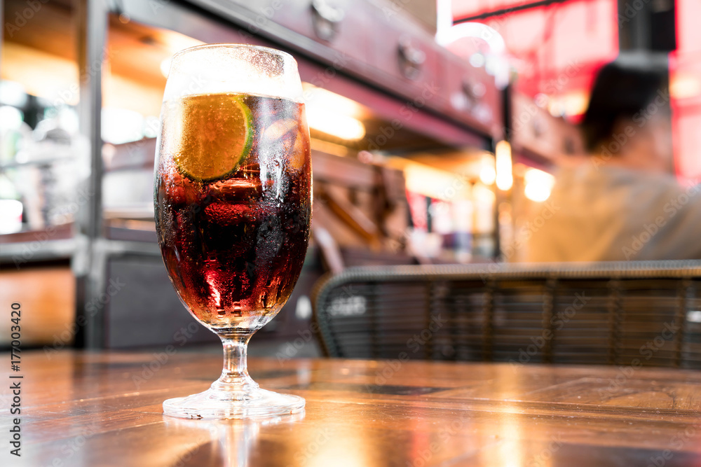 glass of cola on table in restaurant glass of cola on table in restaurant
