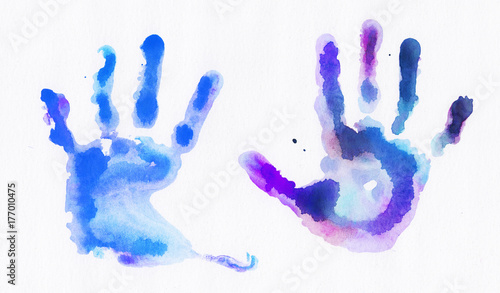 Watercolor handprints over white background