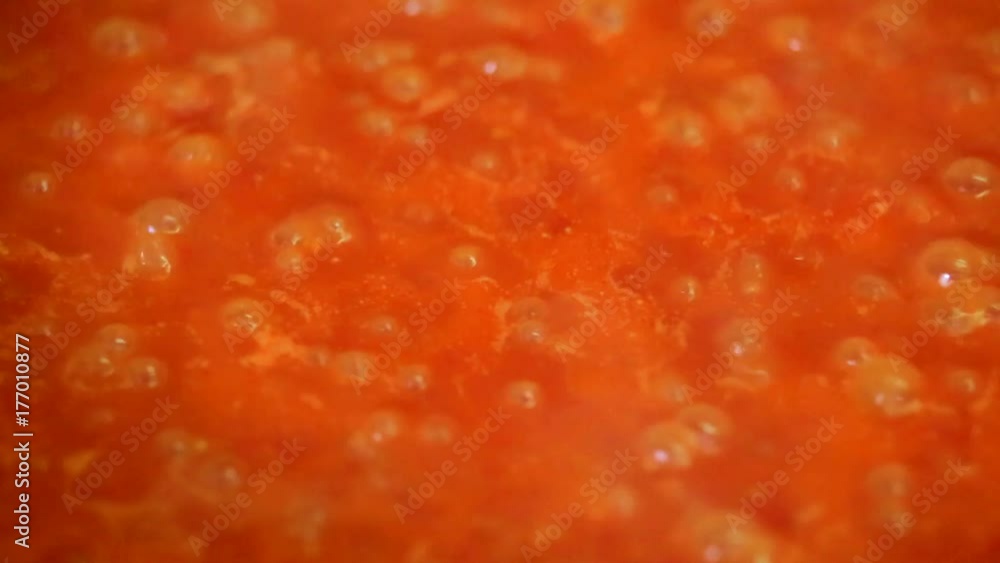 Cooking delicious tomato sauce closeup Cooking delicious tomato sauce closeup