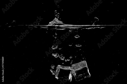 splashing water on black background use as natural background