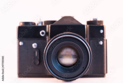 Vintage camera on isolated white background.