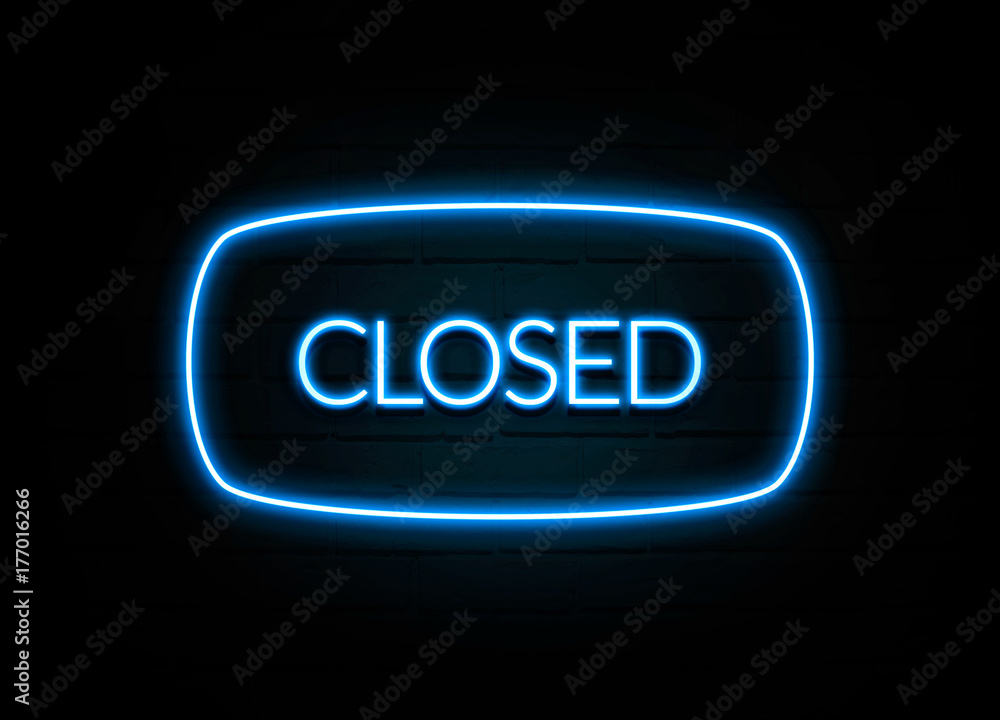 Closed - colorful Neon Sign on brickwall Closed - colorful Neon Sign on brickwall