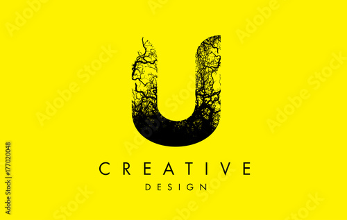 U Logo Letter Made From Black Tree Branches
