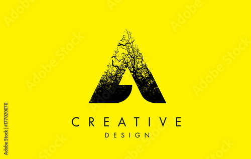A Logo Letter Made From Black Tree Branches