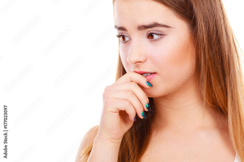 Teenage woman looking worried, thinking about something Teenage woman looking worried, thinking about something