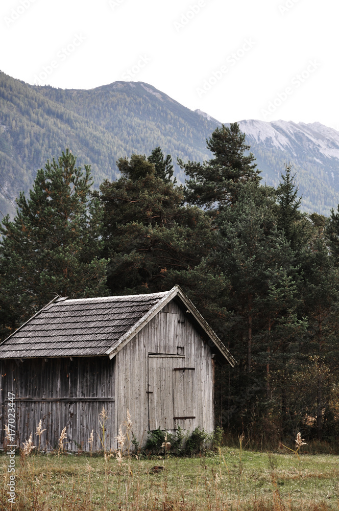 Wooden barns. Traditional agricultural buildings in the alpine region. Wooden barns. Traditional agricultural buildings in the alpine region.