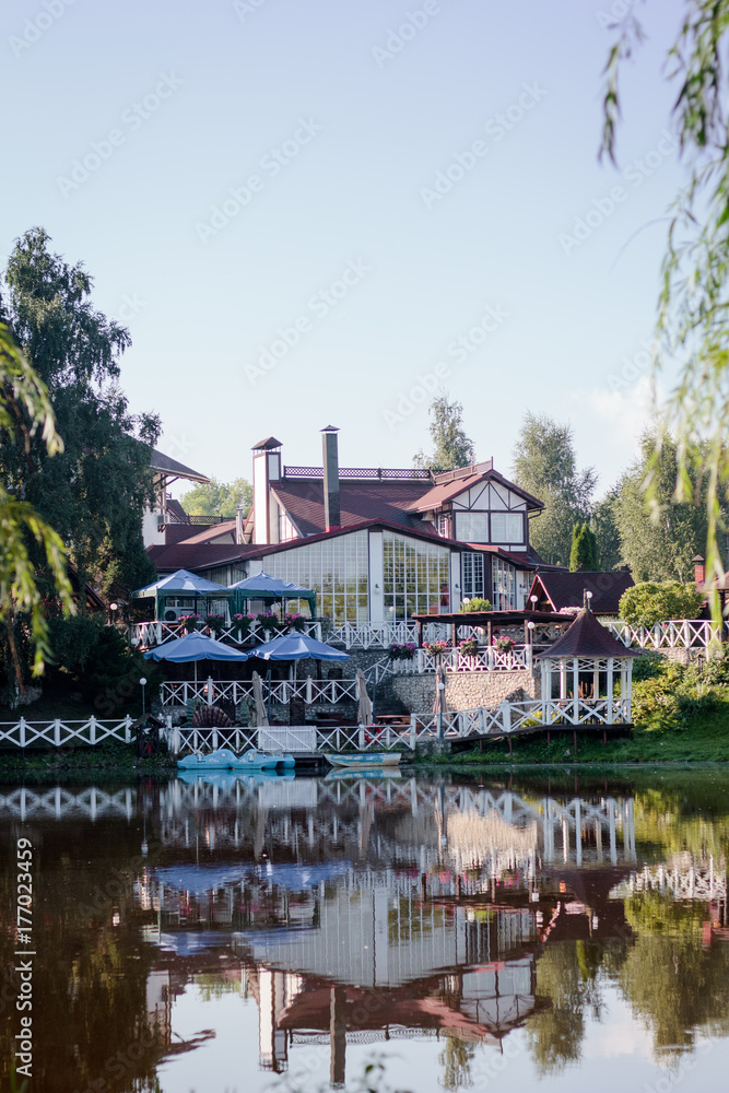 Lake house at the shore of lake, restaraunt at the shore. Lake house at the shore of lake, restaraunt at the shore.