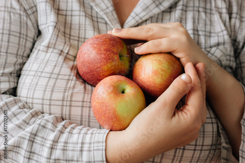 Wallpaper Mural Three fresh apples in a woman hands. Torontodigital.ca