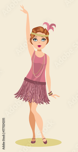 Φωτογραφία Pretty 1920s flapper posing in costume and feathered headpiece of the period