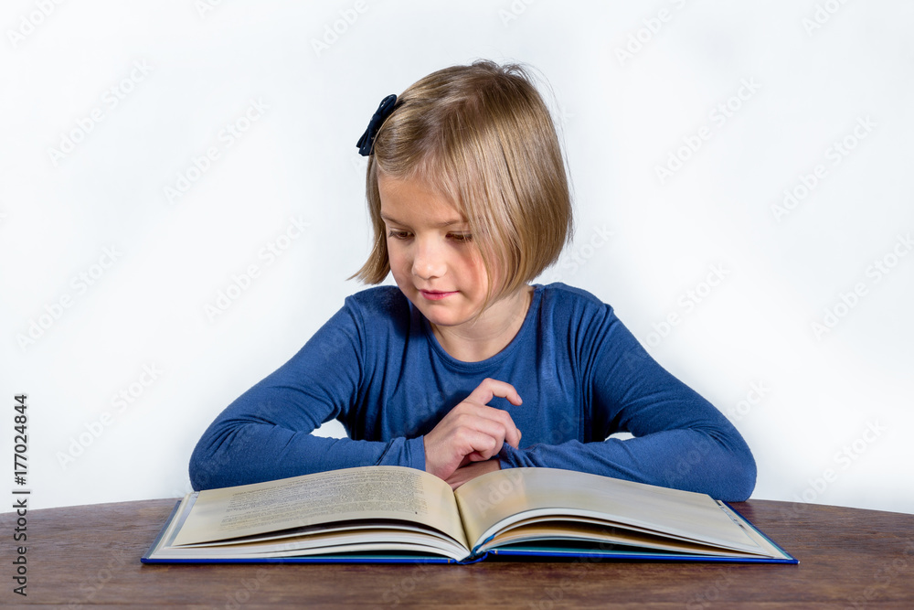 little girl with a book on a white background little girl with a book on a white background