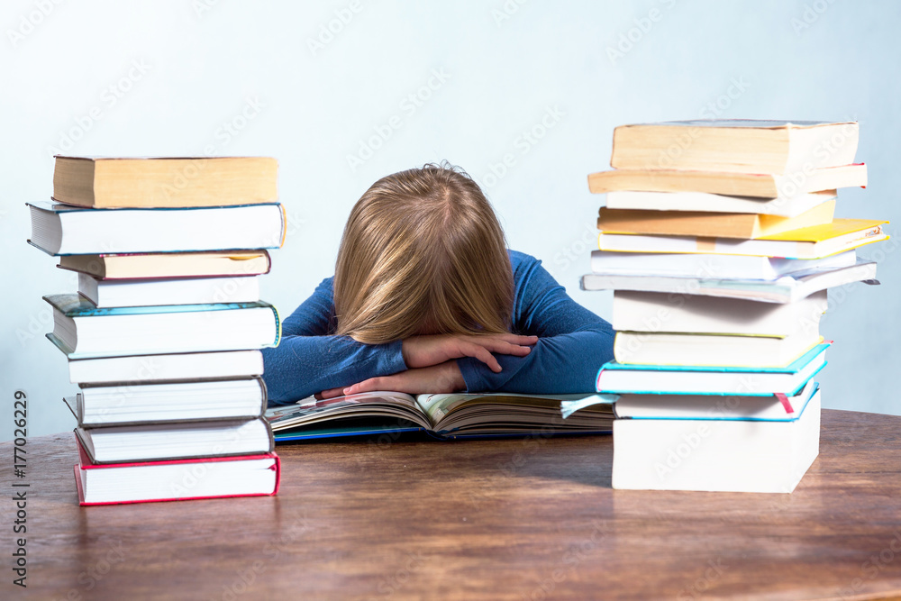 Sleeping girl with book on white background Sleeping girl with book on white background