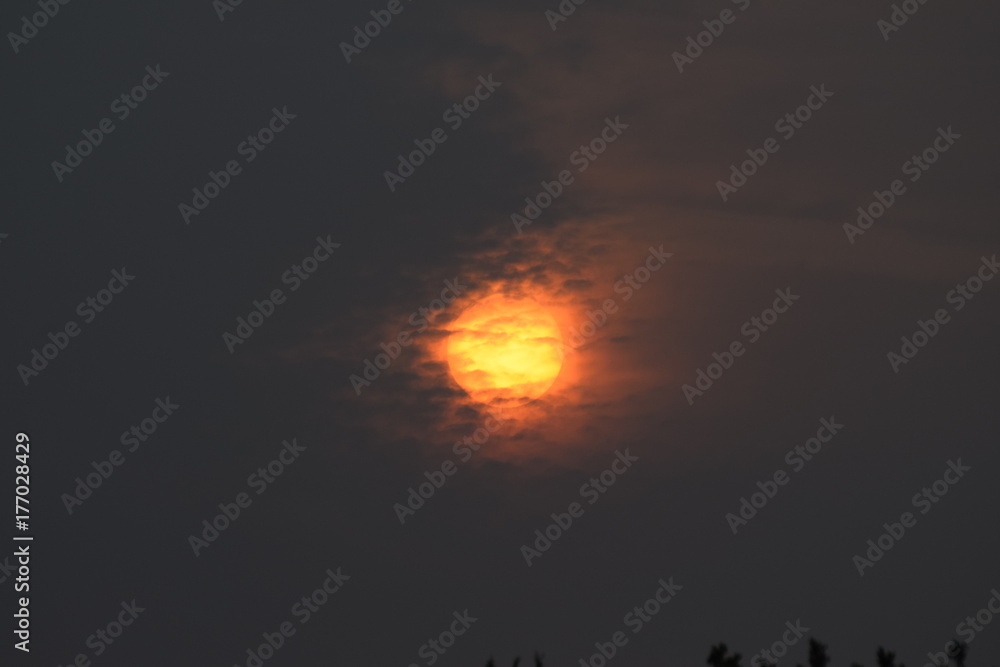 Red sun weather phenomenon due to hurricane ophelia sahara sand Red sun weather phenomenon due to hurricane ophelia sahara sand