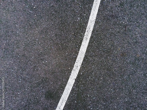 Wallpaper Mural Abstract white lines painted on distressed asphalt concrete surface Torontodigital.ca