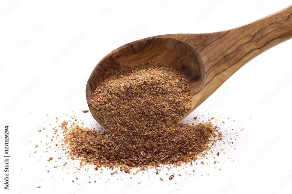 Crushed flax seed in wooden spoon isolated on white background
Crushed flax seed in wooden spoon isolated on white background