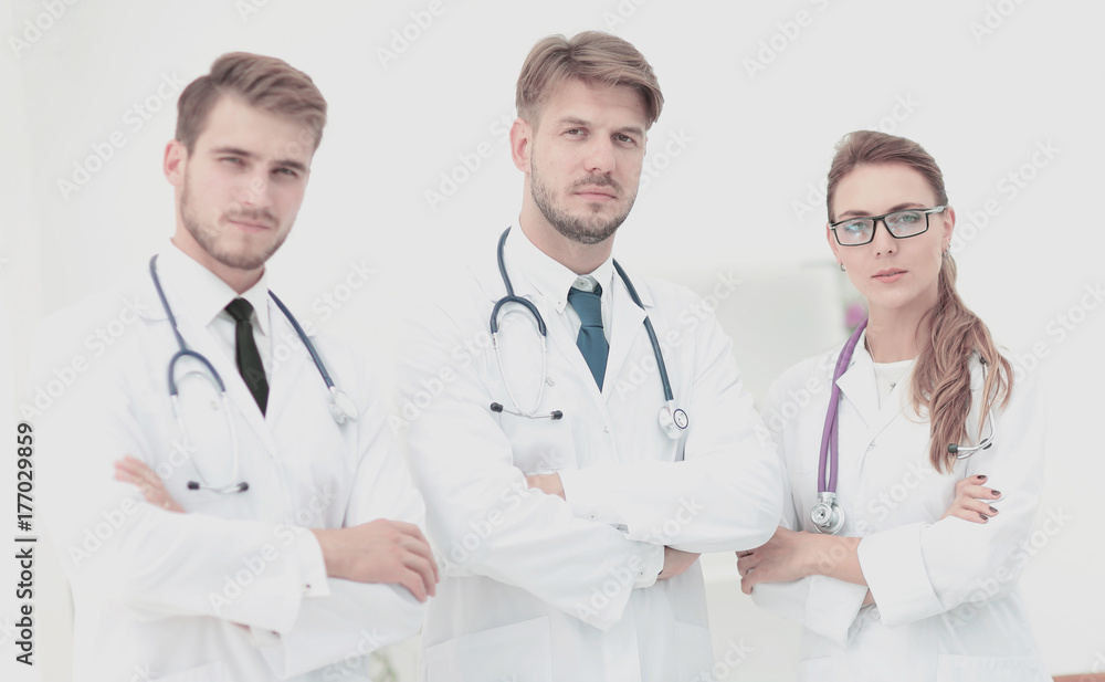Portrait of a group of friendly doctors smiling. Portrait of a group of friendly doctors smiling.
