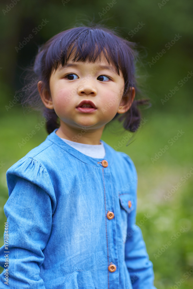 close up of lovely little asian girl outdoor close up of lovely little asian girl outdoor