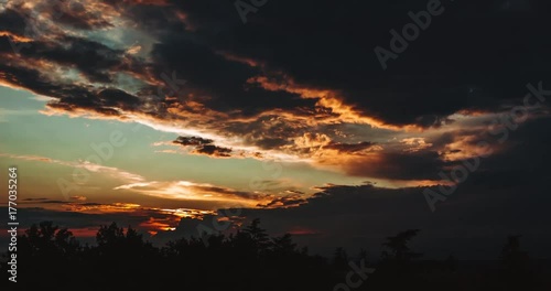 Time lapse clip of clouds at sunset