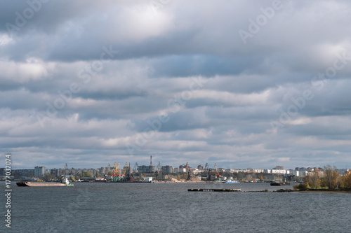 River overlooking the industrial landscape and ships