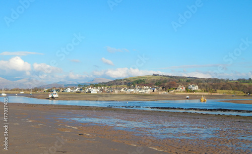Village and boats in low tide