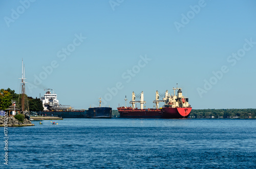 Two Freight Ships passing closely