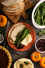Thanksgiving plate with turkey, mashed potatoes and green beans