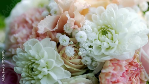beautiful wedding bouquet on a background of foliage.