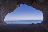 inside view from cave on Cala Gonone beach, Orosei Gulf, Sardinia island in Italy