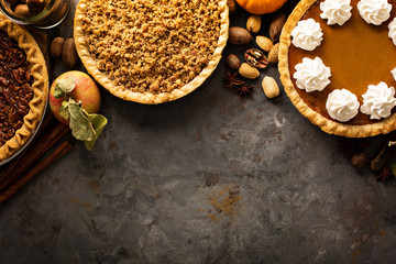 Fall traditional pies pumpkin, pecan and apple crumble