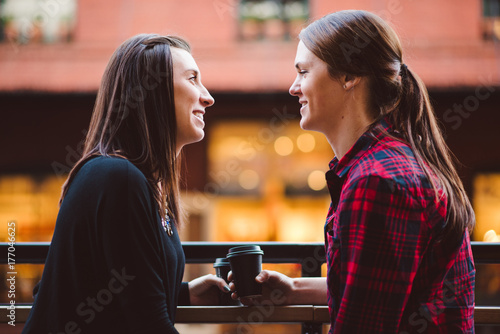 An attractive young lesbian couple on a date downtown photo