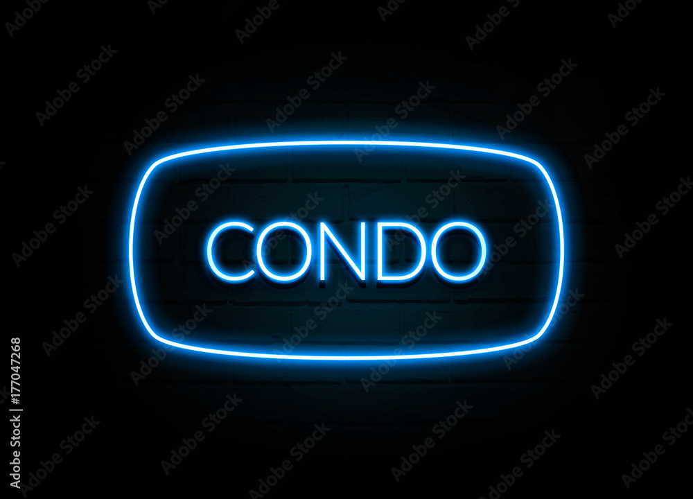 Condo - colorful Neon Sign on brickwall Condo - colorful Neon Sign on brickwall