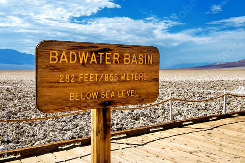 Badwater Basin sign with information about elevation at Death Valley National Park, California, USA photo