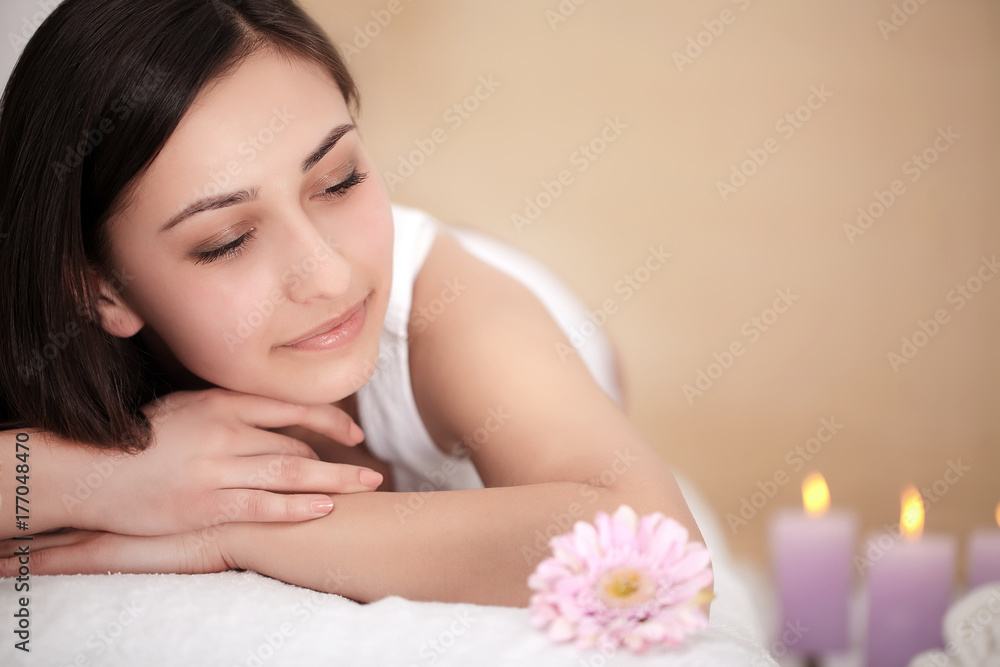 Body Care. Spa Woman. Beauty Treatment Concept. Beautiful Healthy Caucasian Girl Relaxing On Massage Table Before Hand Massage On Relaxed Back In Health And Spa Salon. Skin Care, Wellness, Lifestyle Body Care. Spa Woman. Beauty Treatment Concept. Beautiful Healthy Caucasian Girl Relaxing On Massage Table Before Hand Massage On Relaxed Back In Health And Spa Salon. Skin Care, Wellness, Lifestyle