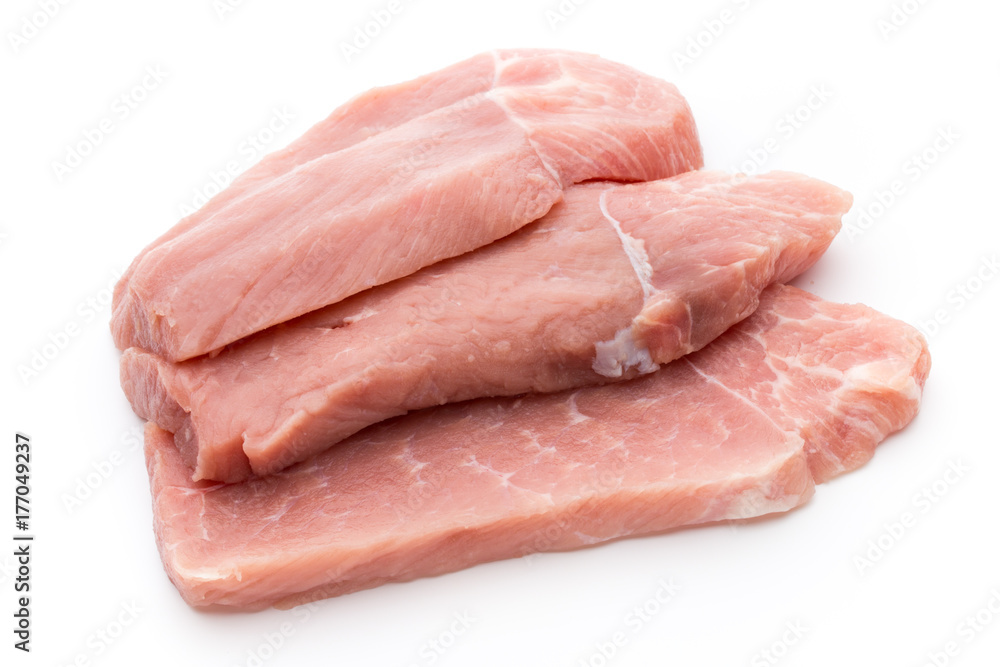 Fresh pork fillet with basil on a white background. Fresh pork fillet with basil on a white background.