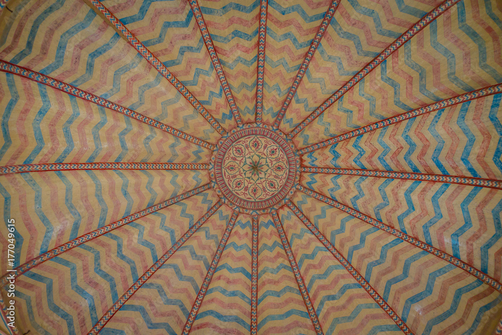 Beautiful carved on the ceiling, Amber Fort near Jaipur, Rajasthan, India. Unesco World Heritage Site