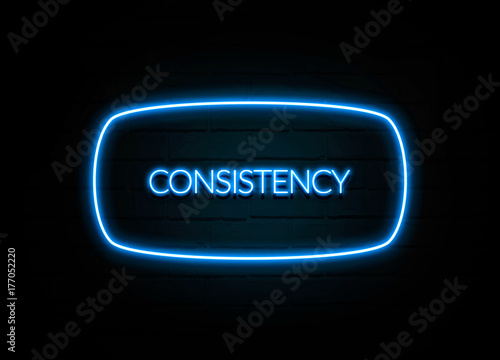 Consistency - colorful Neon Sign on brickwall