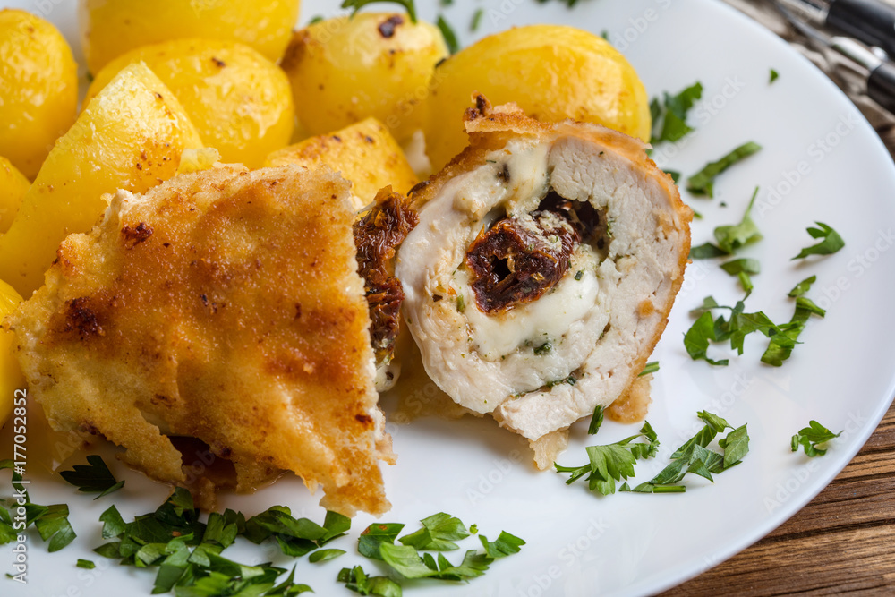 Chicken breast stuffed with cheese and dried tomatoes. Chicken breast stuffed with cheese and dried tomatoes.