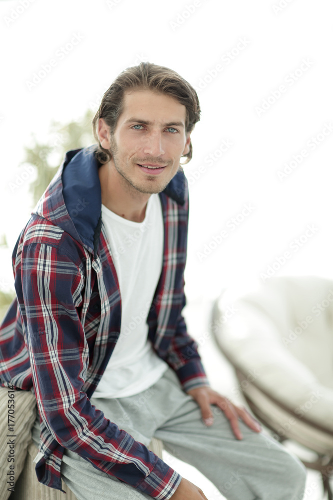 Obraz premium portrait of a successful guy in a checked shirt.