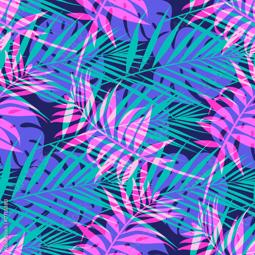Seamless vector pattern with tropical palm leaf in neon colors.